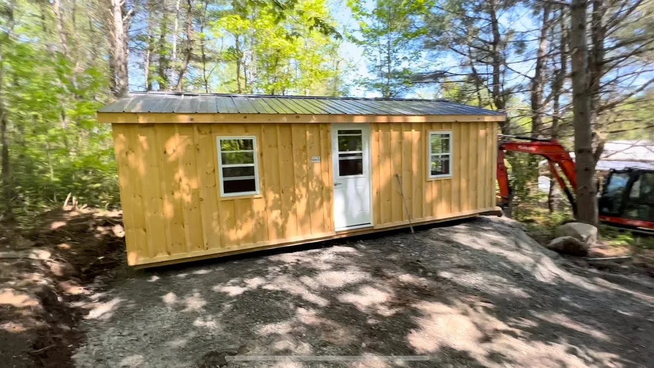 Cabin arriving at forest property